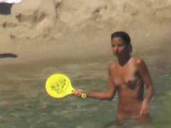 Naked arab girl playing water tennis tanned lines sunbathing